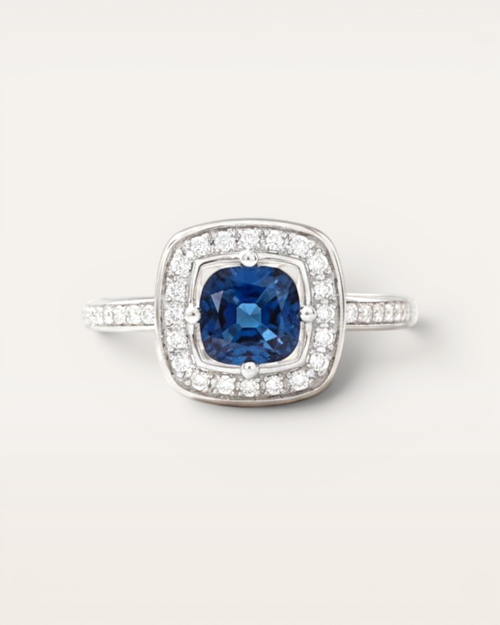 Anillo Celeste Halo de Zafiro y Brillantes en Oro Blanco
