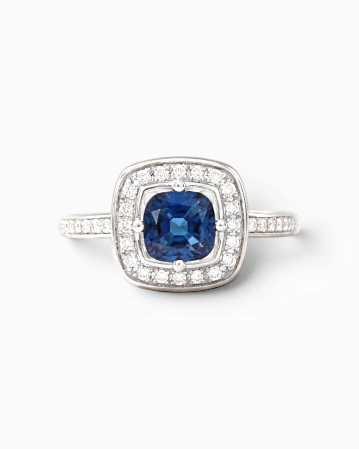 Anillo Celeste Halo de Zafiro y Brillantes en Oro Blanco