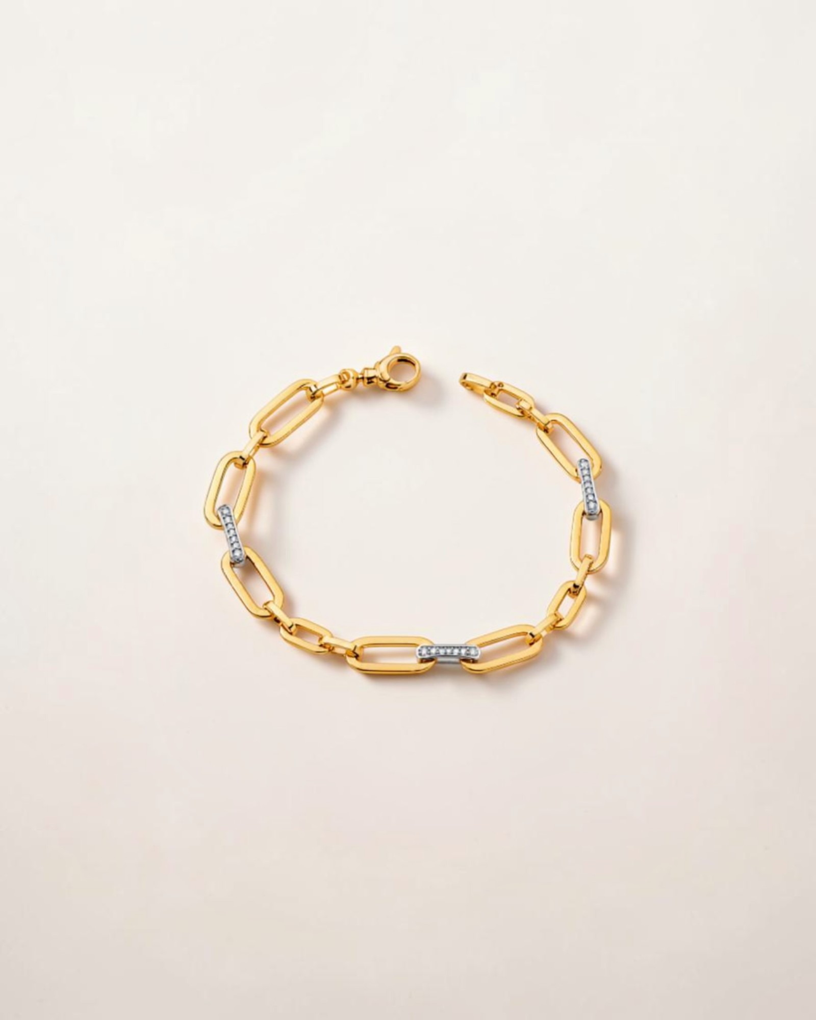 Pulsera de Eslabones con Circonitas en Oro Bicolor
